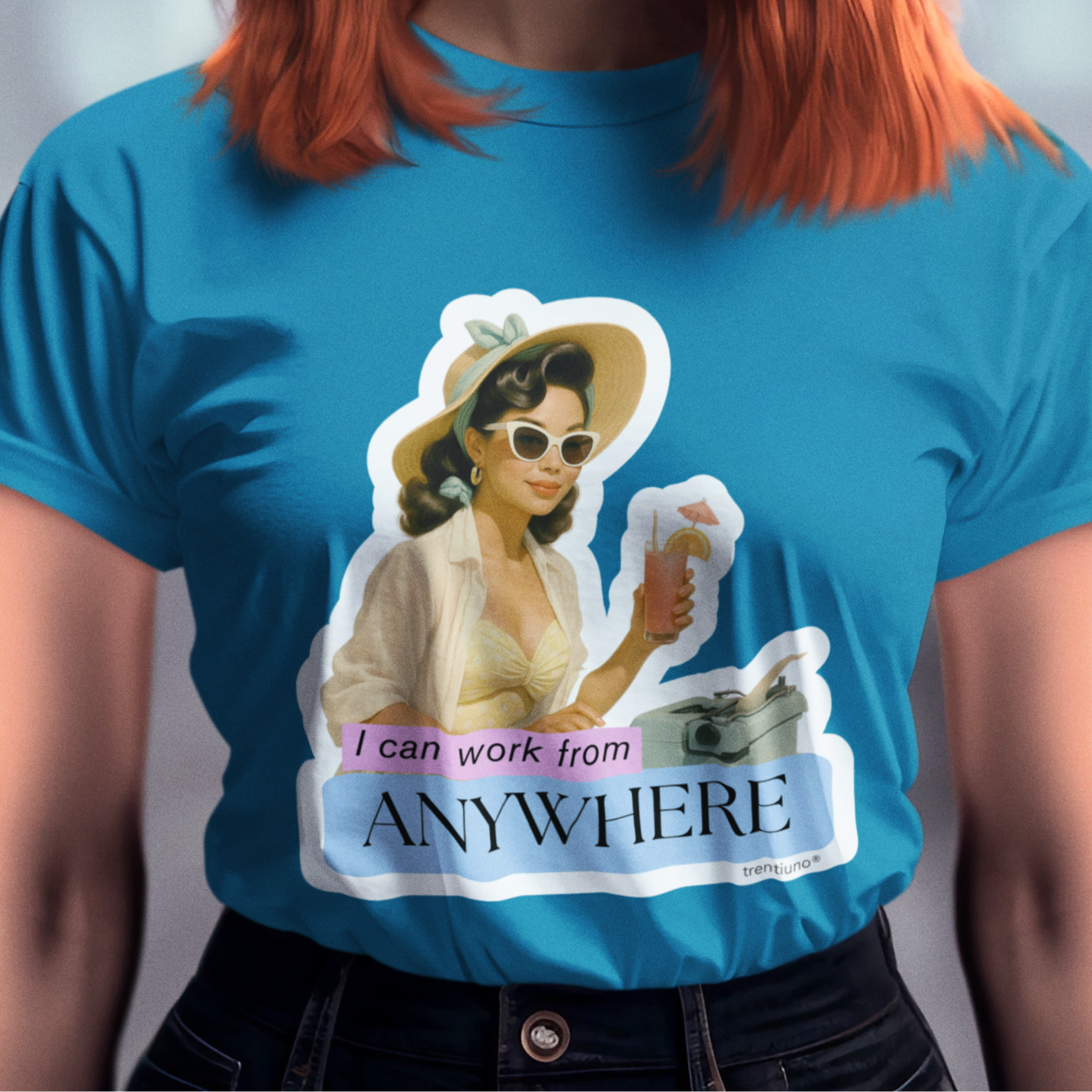 Woman wearing a blue t-shirt with a graphic design and text.